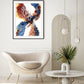 An abstract painting with flowing forms in burnt umbers, deep blues, white, and black, presented in a modern interior setting with a white armchair, wooden floor, and hanging lights.
